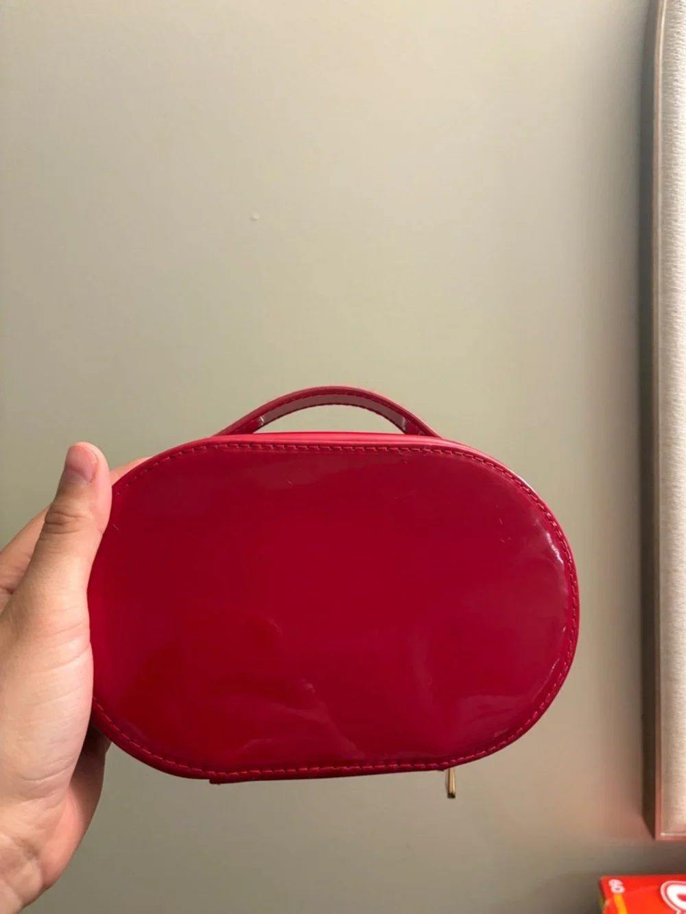 Dior Red Patent Oval Cosmetic Case with Embossed Logo